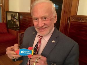Apollo 11 astronaut Buzz Aldrin displays a cookie decorated to mark the renaming of Mount Hebron Middle School in Montclair, New Jersey as Buzz Aldrin Middle School. Credit: Buzz Aldrin